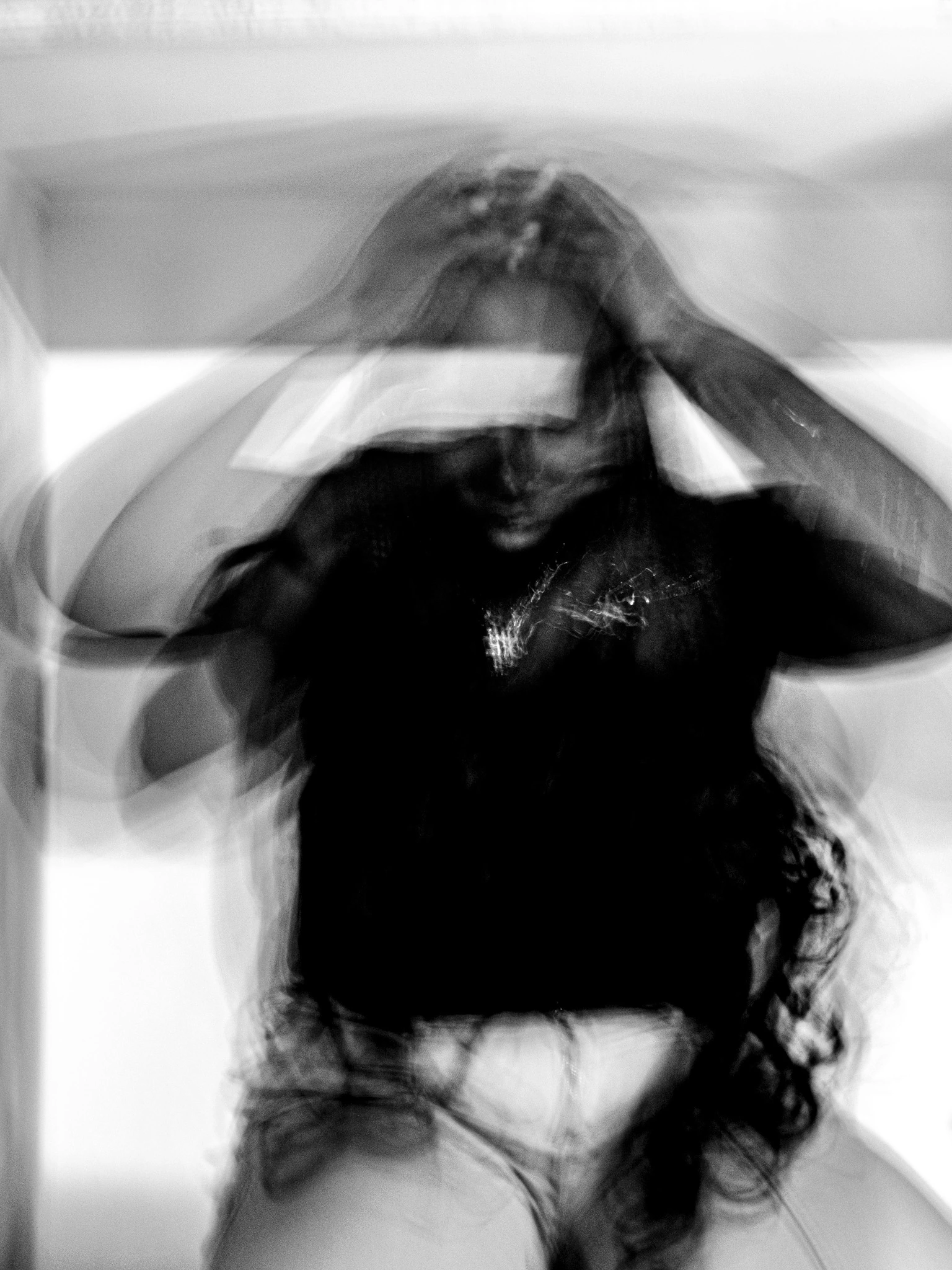 Model standing in a booth